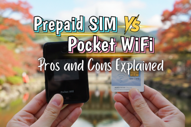 Photo of two hands holding a pocket wifi and SIM card in front of a beautiful Japanese temple.