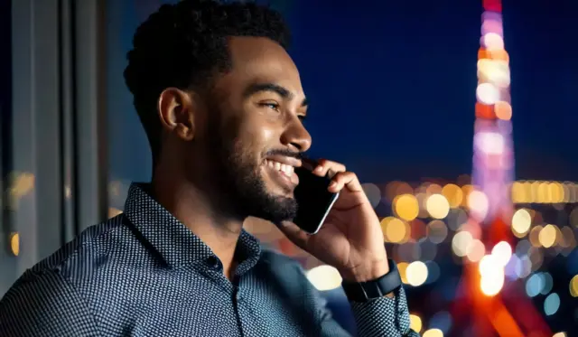 Man making a phone call to customer service to get reassurance.